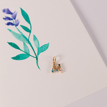 Pendentif plaqué or initiale pierres imitation