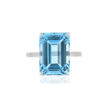 Bague or blanc 750, 1 Topaze bleue de 10,50 carats.