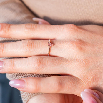 Bague or rose 375 grenat couleur ambrée