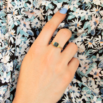 Bague or 375 jaune topaze bleue
