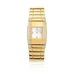 Montre et bracelet acier dor&eacute; pierres imitation