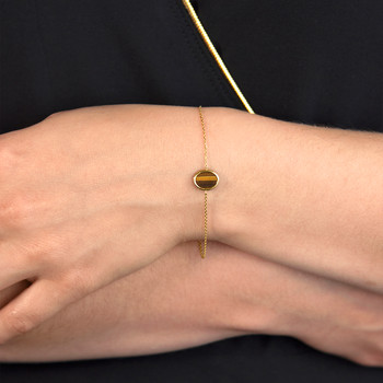 Bracelet or 750 jaune oeil de tigre ovale 18.5 cm