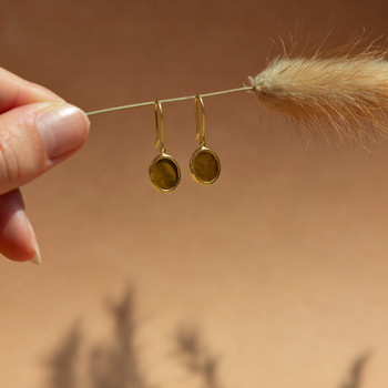 Boucles d'oreilles pendants or 750 jaune oeil de tigre ovale.