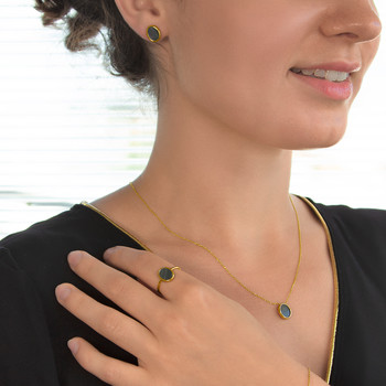 Bague or 750 jaune nacre grise ovale.