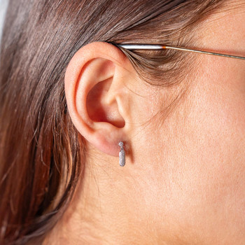 Boucles d'oreille or 375 blanc diamants