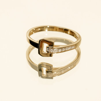Bague or recyclé 750 jaune boucle et demi-tour diamants