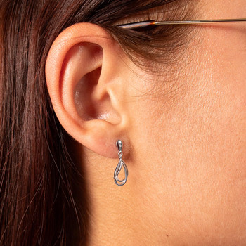 Boucles d'oreilles or 375 blanc diamants