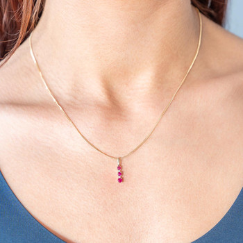 Pendentif or 375 2 tons rubis et diamants