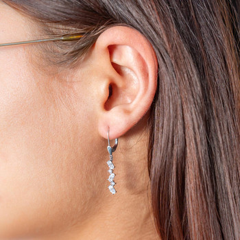 Boucles d'oreilles or 375 blanc dormeuses zirconias