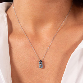 Pendentif or 375 blanc topazes bleues traitées