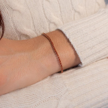 Bracelet acier doré zirconias rouges 19 cm