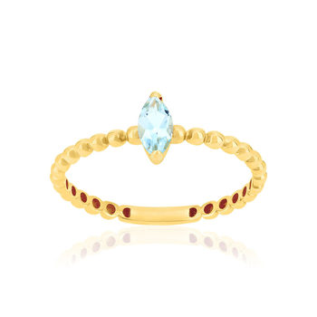 Bague or 375 jaune topaze bleue