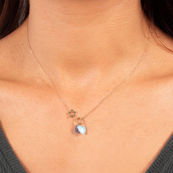 Collier or 375 jaune étoile et zirconias bleus 45cm