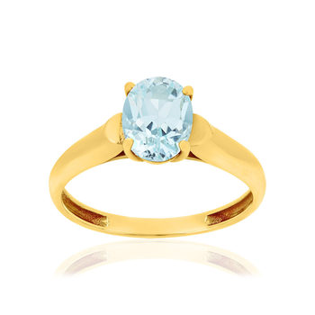 Bague or 375 jaune topaze bleue traitée