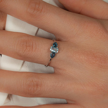 Bague or 375 blanc topazes bleues