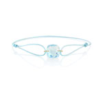 Bracelet or topaze bleue trait&eacute;e s/cordon bleu