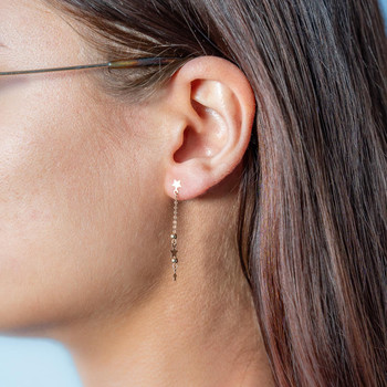 Boucles d'oreilles or 750 jaune pendants étoiles