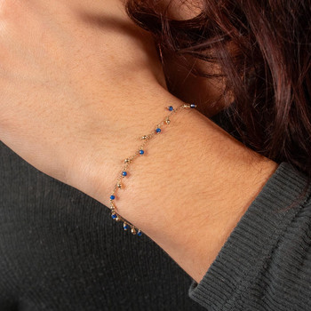 Bracelet or 375 jaune pierres synthétiques bleues 19cm