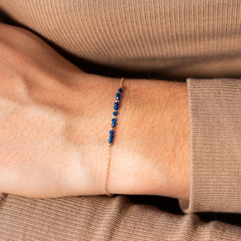Bracelet or 375 jaune pierres synthétiques bleues 19cm