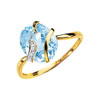 Bague or 750 2 tons topaze bleue traitée et diamant