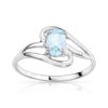 Bague or 750 blanc topaze bleue traitée