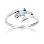 Bague or 750 blanc topaze bleue trait&eacute;e