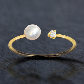 Bague or 375 jaune perle et zirconias