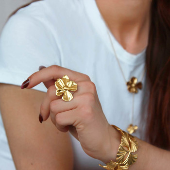 Bague acier jaune motif fleur