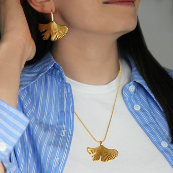 Collier acier jaune motif fleur 55cm