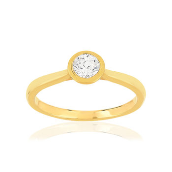 Bague plaqué or jaune zirconias serti clos