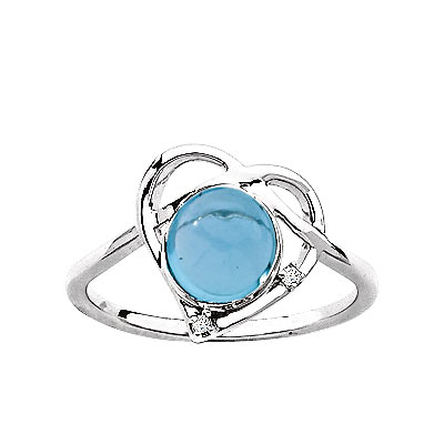 Bague or 375 blanc topaze bleue traitée et diamant