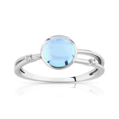 Bague or blanc 375 topaze bleue traitée diamants
