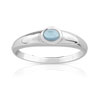 Bague or 375 blanc topaze bleue traitée