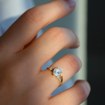 Bague or 750 2 tons aigue-marine ovale et diamants