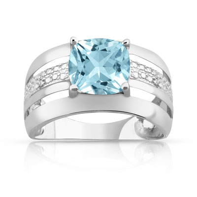 Bague or 750 blanc topaze bleue traitée et diamant