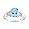 Bague or 750 blanc topaze bleue traitée