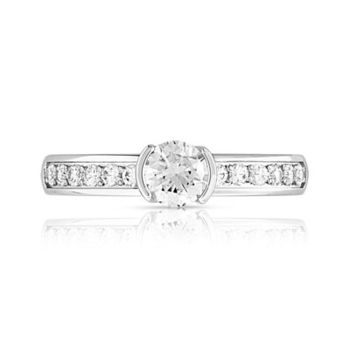 Bague solitaire or 750 blanc diamant 60/100e de carat