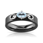Bague or 375 blanc topaze bleue trait&eacute;e et c&eacute;ramique noire