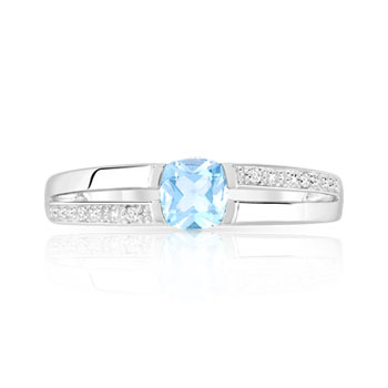 Bague or 375 blanc topaze bleue traitée et diamants