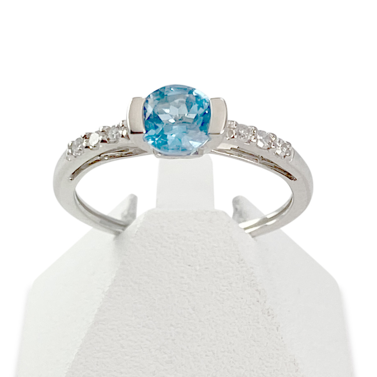 Bague d'occasion or 375 blanc topaze bleue traitée et diamant