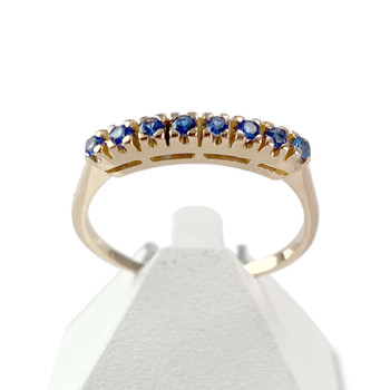 Bague d'occasion or 750 jaune zirconias bleus