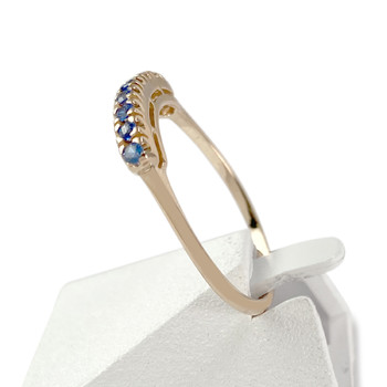 Bague d'occasion or 750 jaune zirconias bleus