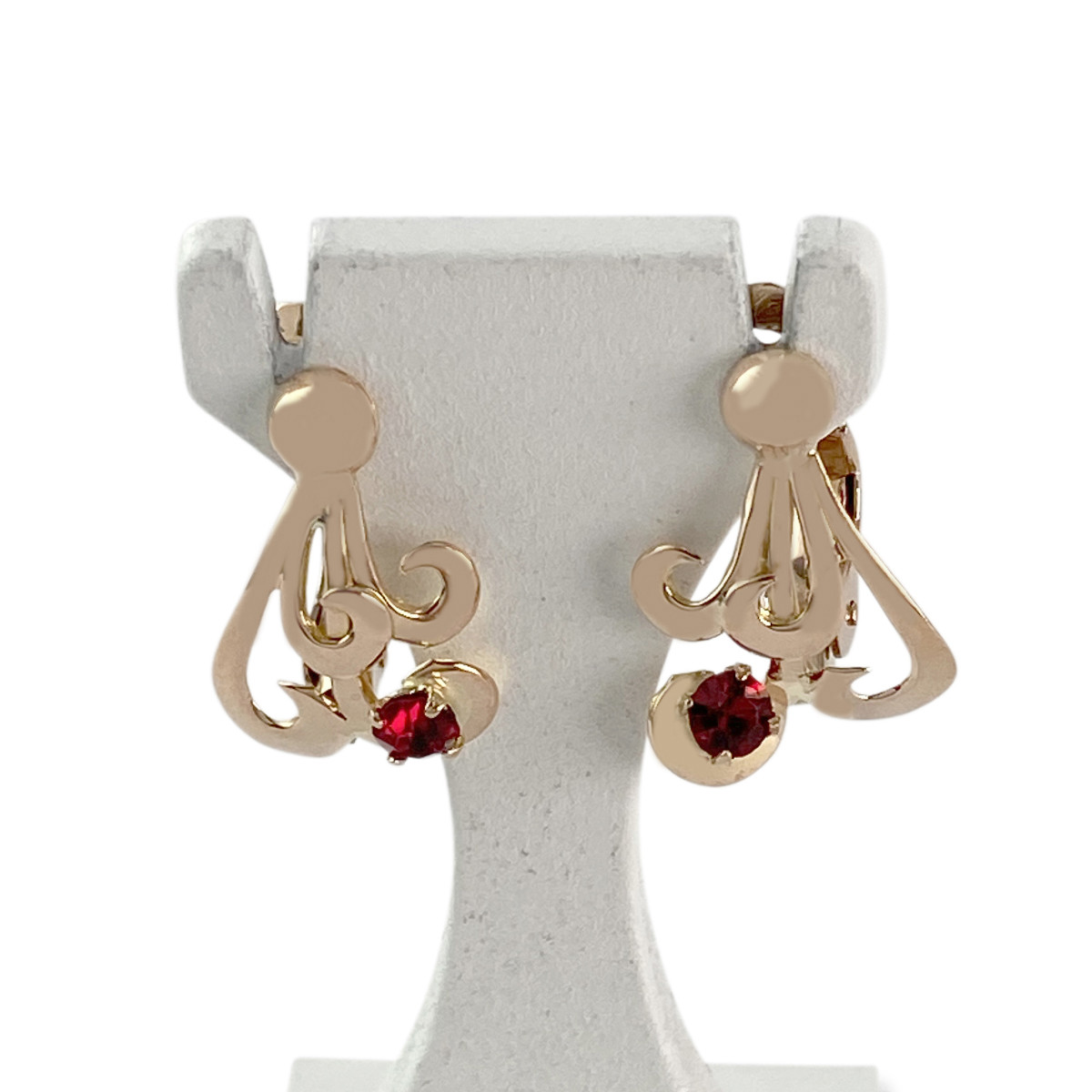 Boucles d'oreilles d'occasion or 750 jaune pierres rouges synthétiques