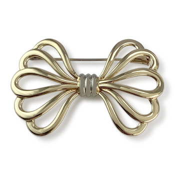 Second-hand CHRISTOFLE brooch in 750 yellow gold and rhodium