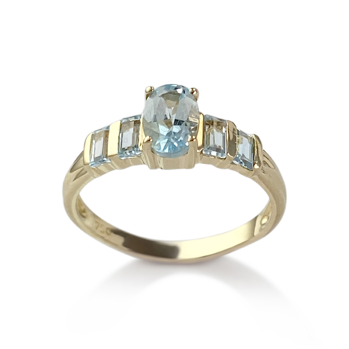 Bague d'occasion or 750 jaune topazes bleue traitée