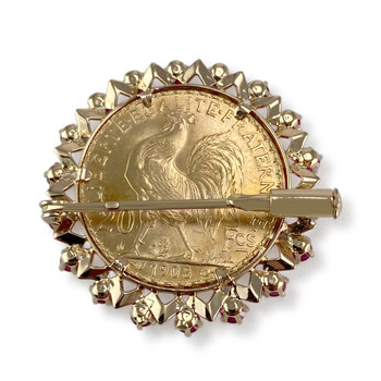 Second-hand 750 yellow gold synthetic ruby brooch