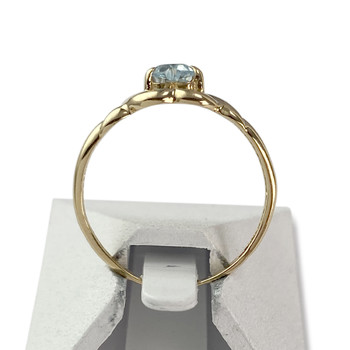 Bague d'occasion or 750 jaune topaze traitée sky blue coeur