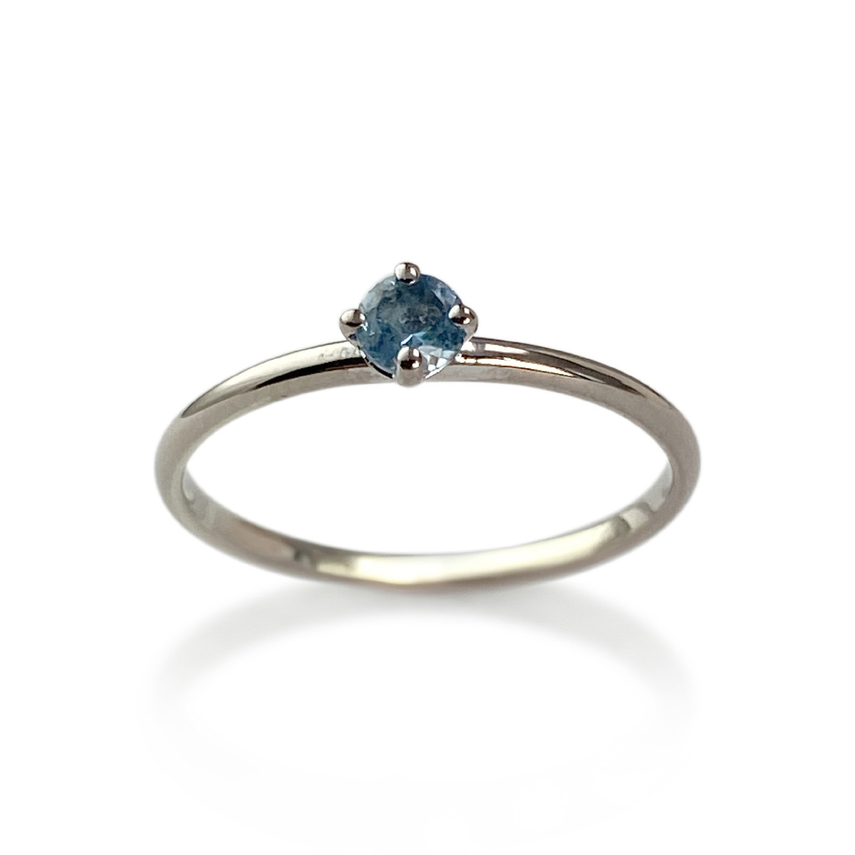 Bague d'occasion or 750 blanc topaze bleue