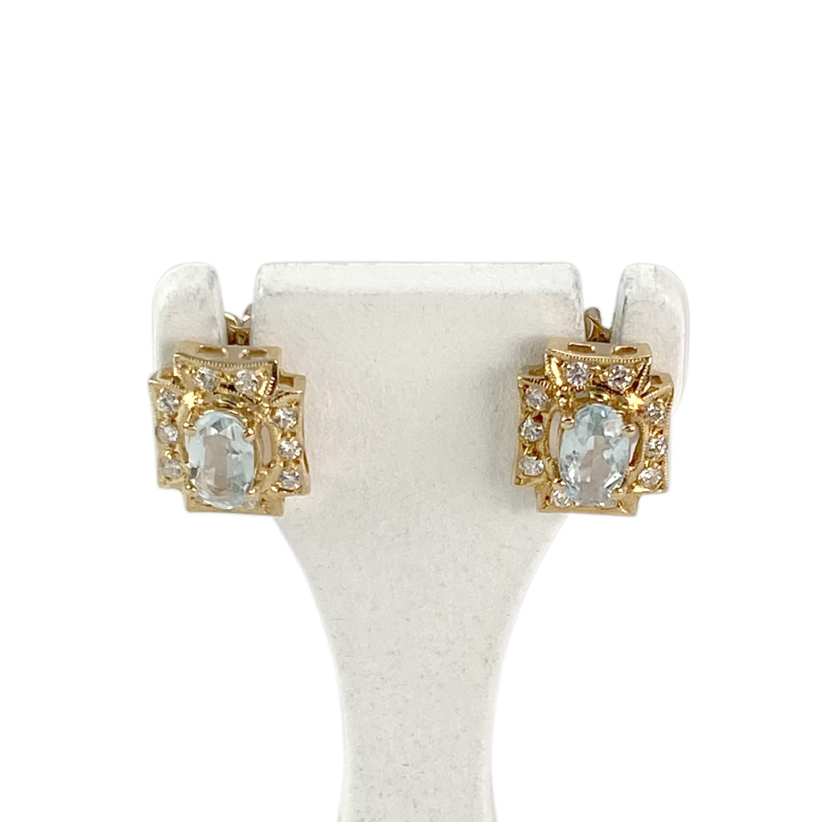 Boucles d'oreilles clous d'occasion or 750 jaune aigues marines zirconias