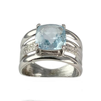 Second-hand gold ring 750 white blue topaz treated with diamonds